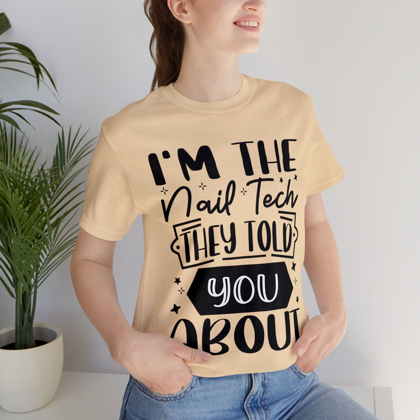 "I'm the Nail Tech They Told You About." Bold Text Graphic Unisex Jersey Short Sleeve Tee